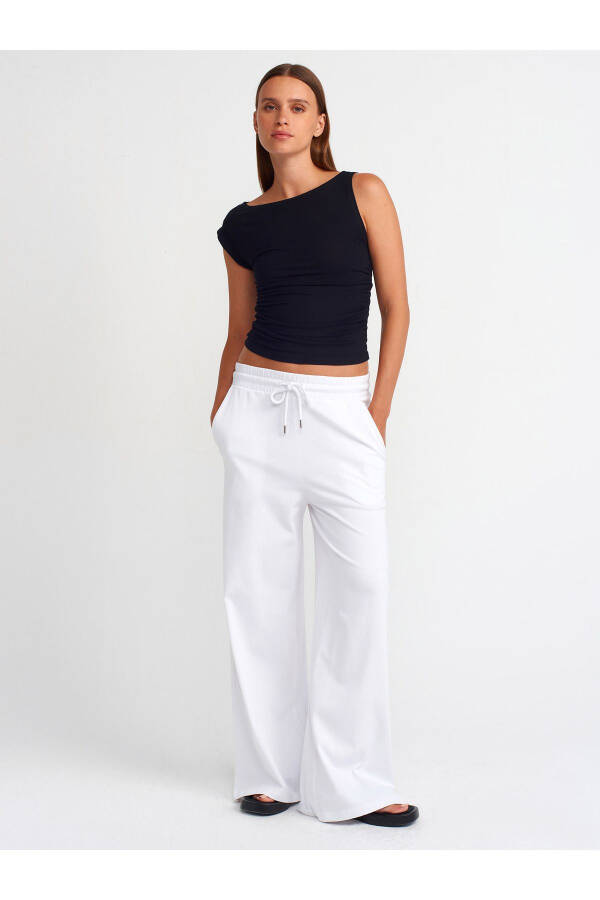 31089 Asymmetrical Screw Detail Top-Black - 11
