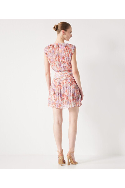 A patterned dress with ruffles. - 6