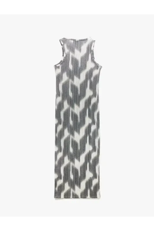 Abstrakt naqshli yengsiz velosiped yoqali midi qalam ko'ylak - 4