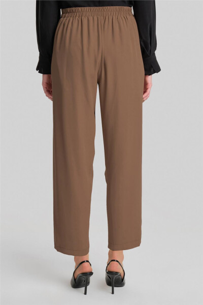 Asymmetrical belted pants, code 24Y2609, almond color. - 5