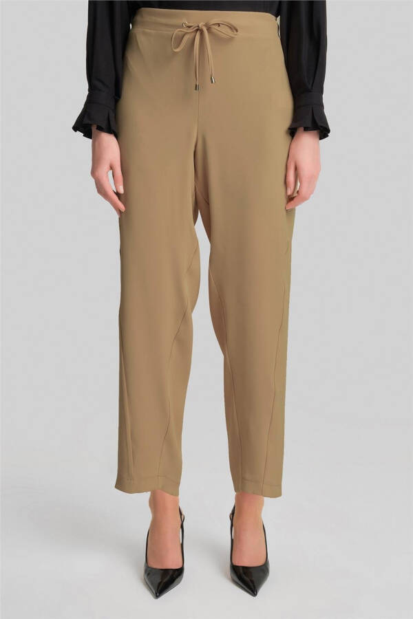 Asymmetrical cuffed pants, 24Y2609, Biscuit color. - 8