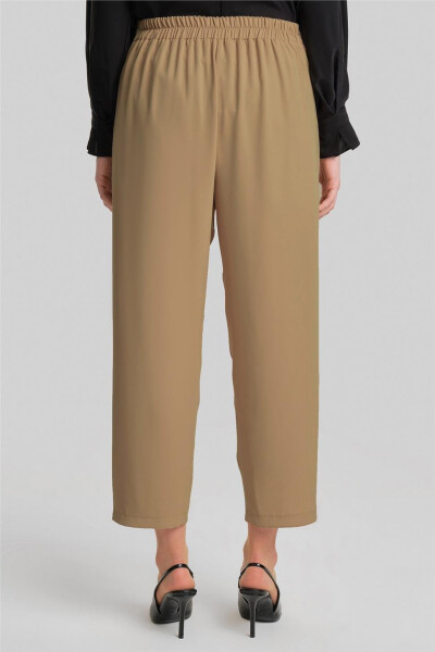 Asymmetrical cuffed pants, 24Y2609, Biscuit color. - 10