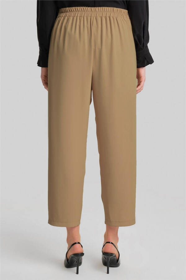Asymmetrical cuffed pants, 24Y2609, Biscuit color. - 10