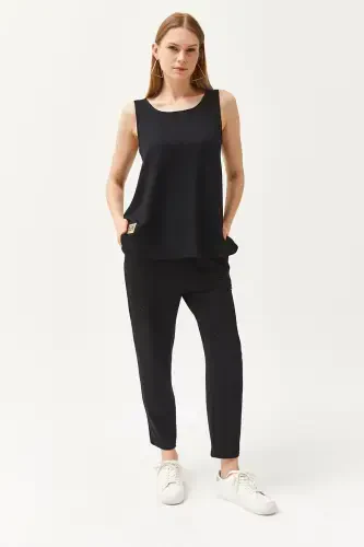 Ayol qora yengsiz keng bluzkali pastki yuqori billur toshli - 8