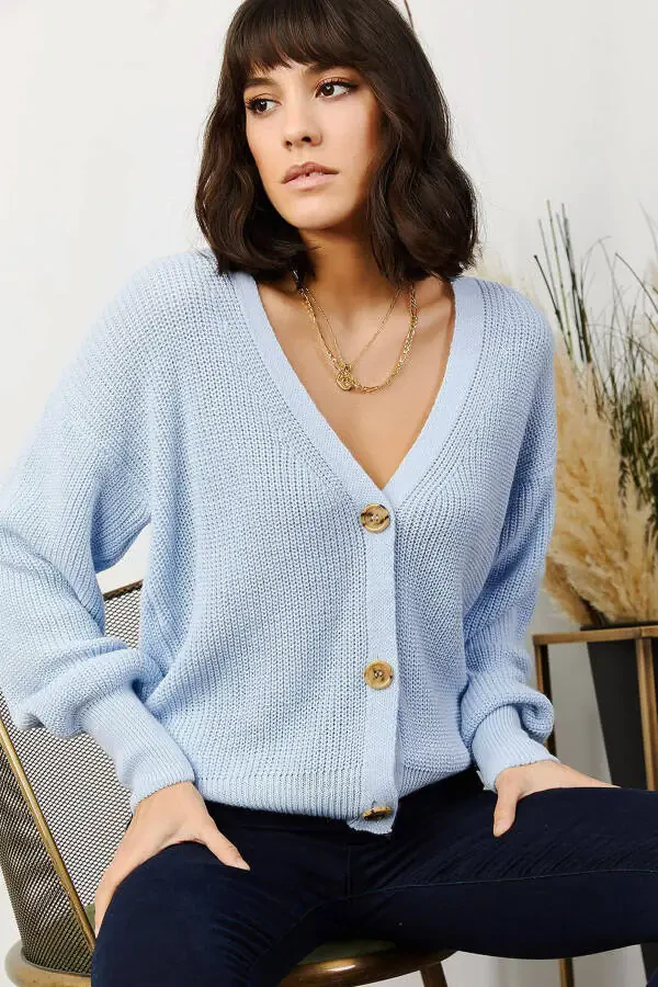 Ayollar chaqalog'i uchun ko'k rangli tugmali triko kardigan - 1