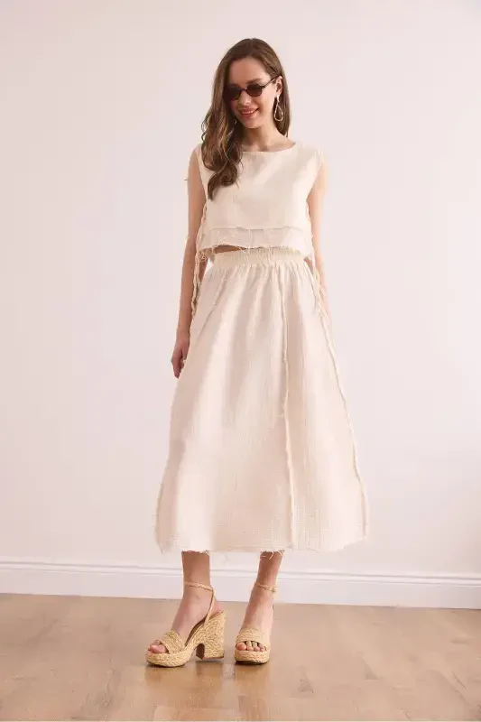 Ayollar oq belidagi elastik tikuvli muslin yubka ETK - 2