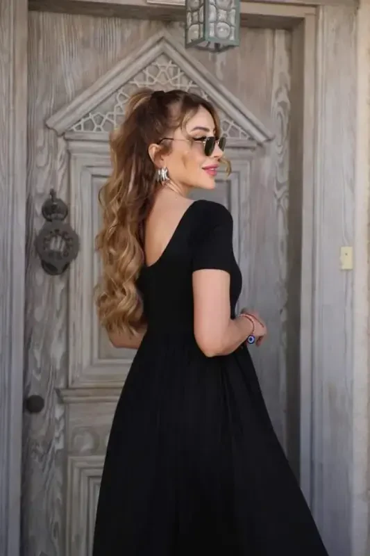 Ayollar qisqa yengli yumaloq bo'yinli oldindan yirtqichli cho'ntakli viskoza uzun ko'ylak - 2