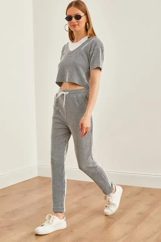 Ayollar tutuni ustki garniturali bluz pastki cho'ntakli tor shim - OLALOOK