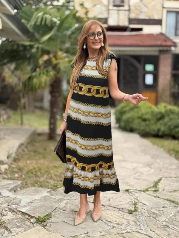 Ayollar yelkalaridan burmali qayiq yoqali, volanli, janjan krep ko'ylak - 1