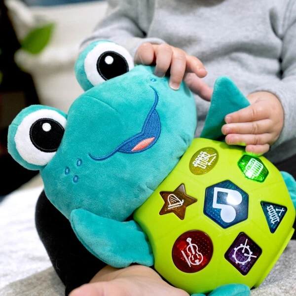 Baby Einstein Neptune’s Cuddly Composer Musical Discovery Toy 6 oydan + - 9