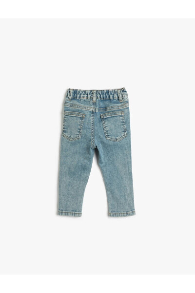 Baby girl jeans with pockets and elastic waistband. - 2