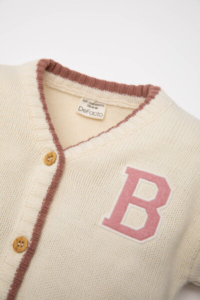 Baby V-neck, button-up knitted cardigan. - 2