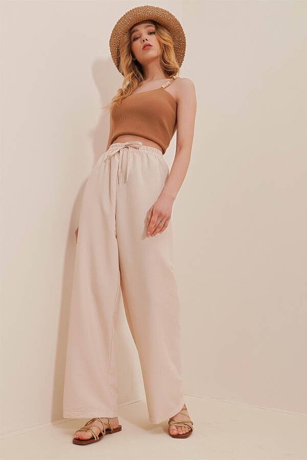Beige, elastic waist, relaxed fit aerobics pants. ALC-X6625 - 2