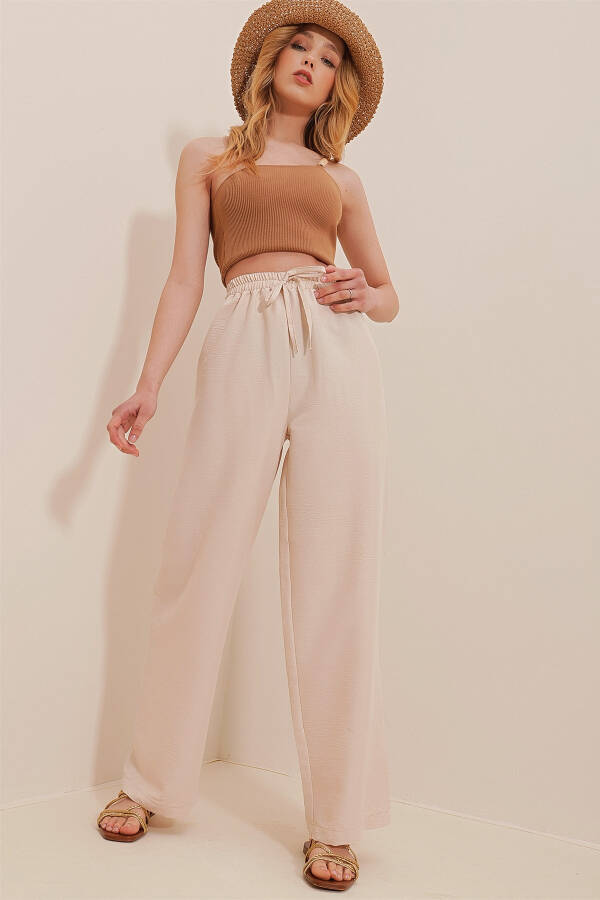 Beige, elastic waist, relaxed fit aerobics pants. ALC-X6625 - 3