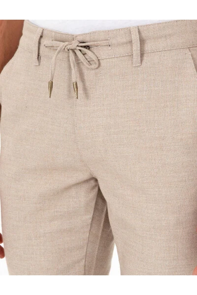 Бежевые брюки из канваса Slim Fit - 5