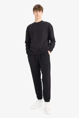 Black crew neck sweatshirt - DEFACTO (1)