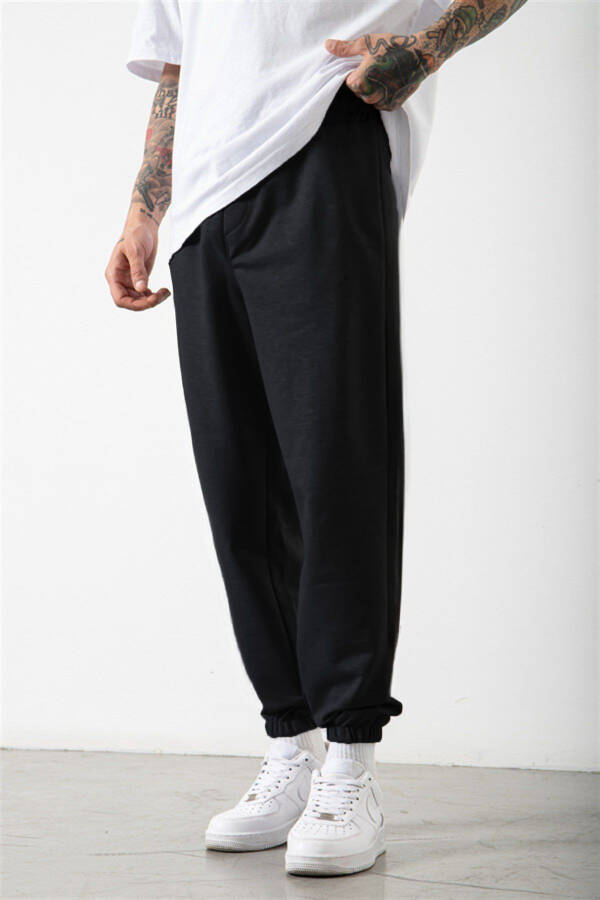 Black Jogger Sweatpants - Leg Print Detail - 2