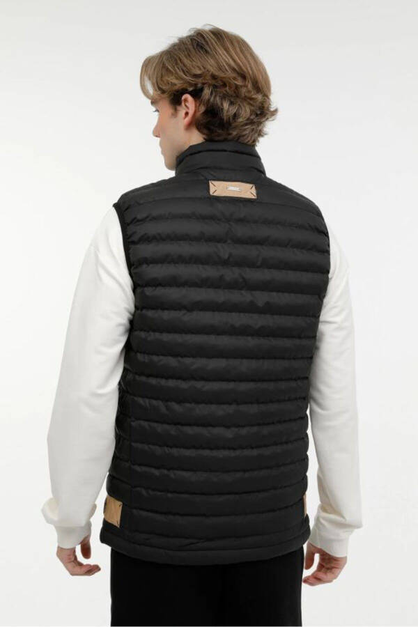 Black men's vest size ML - 2