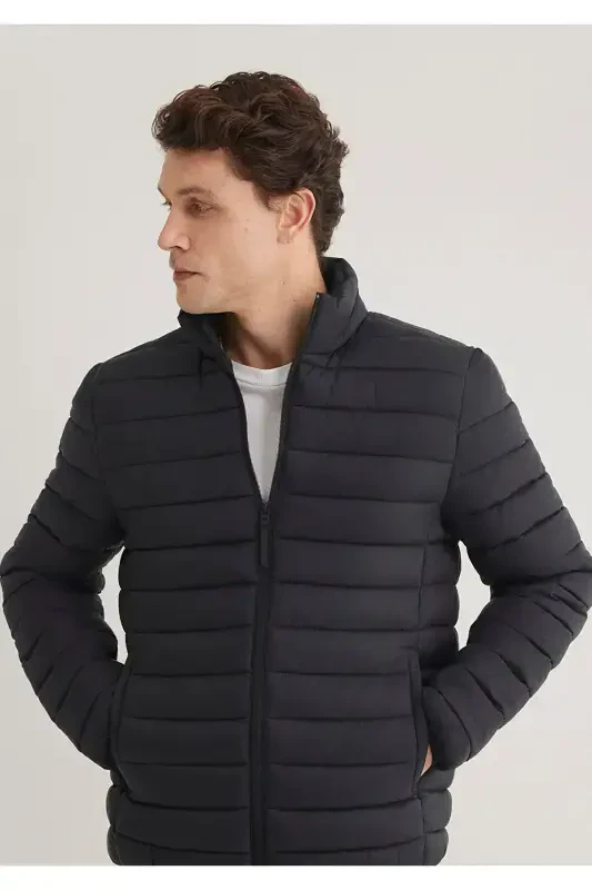 Black puffer jacket, stand-up collar. - 2