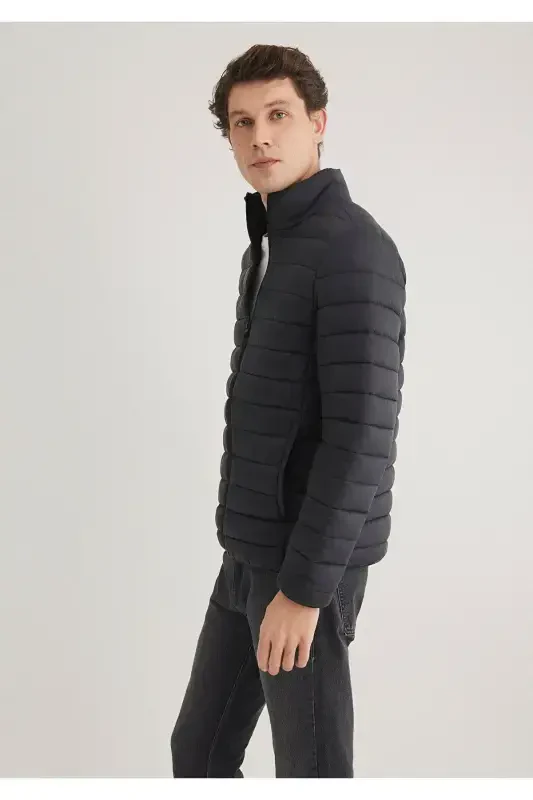 Black puffer jacket, stand-up collar. - 3