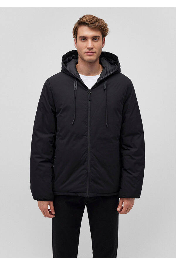 Blue hooded black puffer jacket - 1