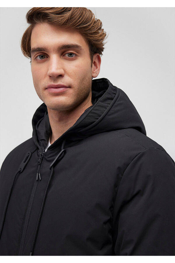 Blue hooded black puffer jacket - 3