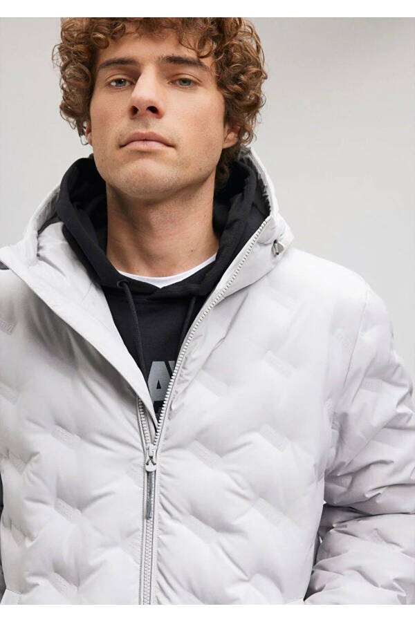 Blue hooded, quilted grey jacket - 2