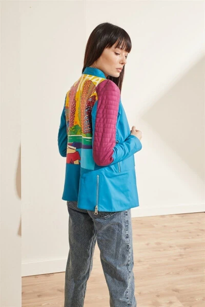 Blue leather biker jacket with Doha city print. - DERIDERIM (1)