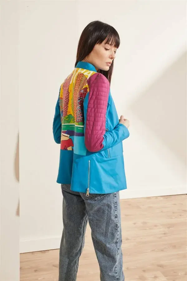 Blue leather biker jacket with Doha city print. - 2