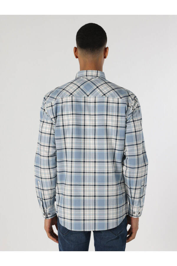 Blue, long-sleeved, regular fit men's shirt with a checkered pocket detail. - 2