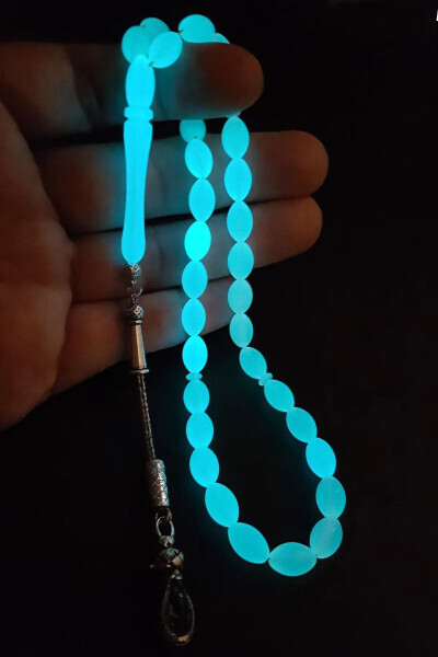 Blue phosphorescent barley cut cat's eye rosary. - İNDİRİM CENTER