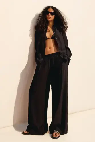 Брюки с широкими штанинами и шнурком. - 1