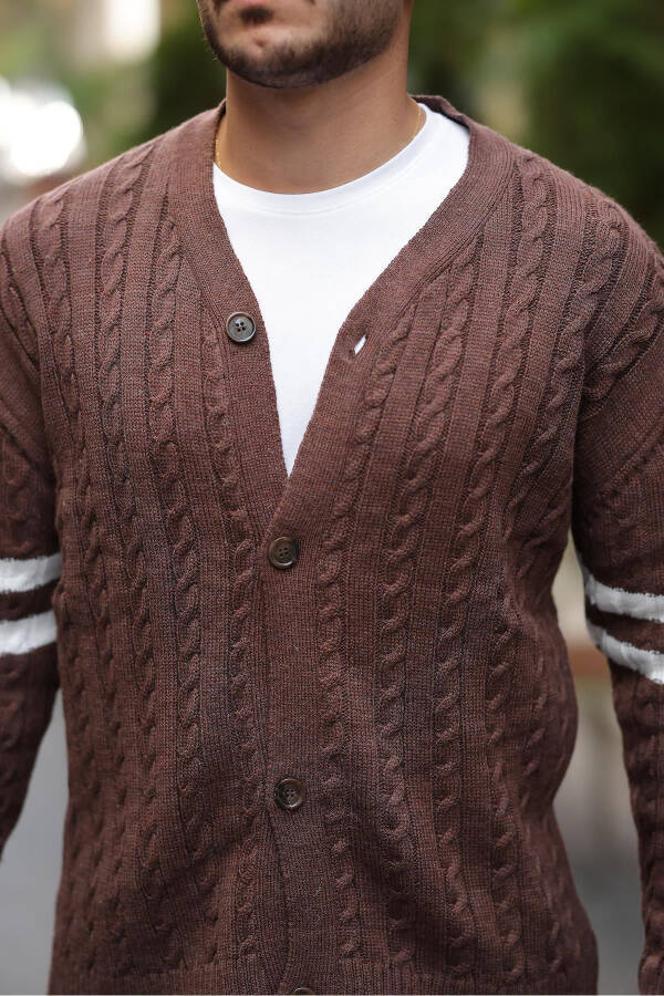 Brown knitted cardigan with braid sleeves and ribbon details. - 4