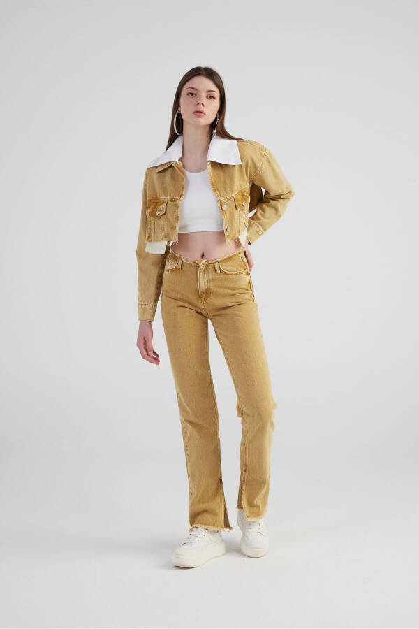 Camel-colored straight-leg jeans with marble print, frayed details, and a slit. - 14