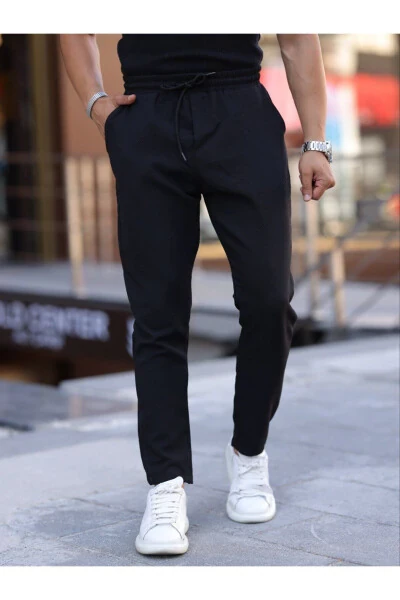 Черные мужские джоггеры с завязками, эластичным поясом, прямыми штанинами и текстурой - 4