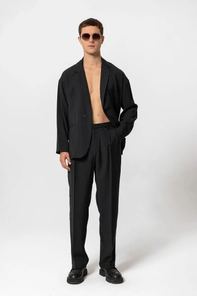 Черный мужской блейзер без подкладки в стиле оверсайз - 10