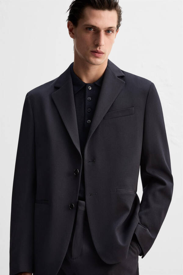 Classic, 100% wool navy blazer. - 13