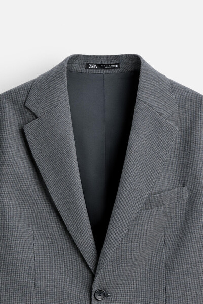 Classic, herringbone patterned, dusty blue blazer. - 9