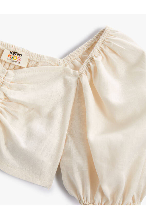 Crop blouse with balloon sleeves, drawstring detail, and linen blend. - 3