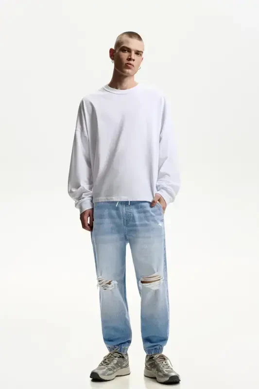 Distressed jogger jean-Washed medium blue - 1