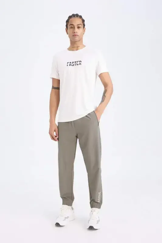 Dokuma Esnek Multifonksiyonel Sporcu Jogger Eşofman Altı Slim Fit Dar Kesim Çift Cepli-Haki - 7