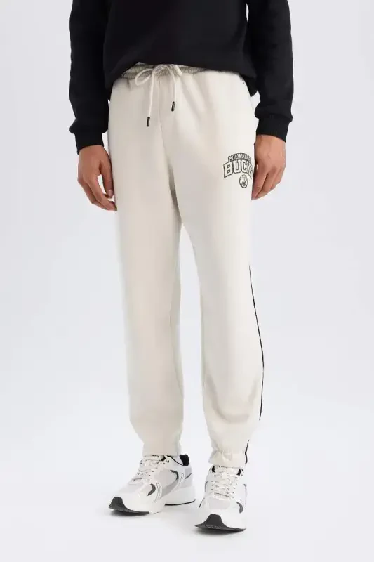 DeFactoFit NBA Milwaukee Bucks Jogger Спортивные Штаны Стандартного Кроя С Карманами Эластичный Пояс Эластичные Манжеты Ткань Для Подводного Плавания-Камень - 9