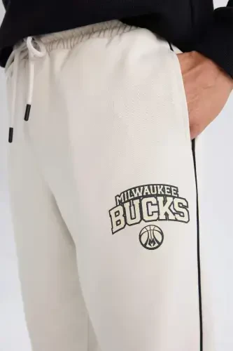 DeFactoFit NBA Milwaukee Bucks Jogger Sweatpants Standard Fit Pocketed Elastic Banded Leg Scuba Diver Fabric-Stone - 1