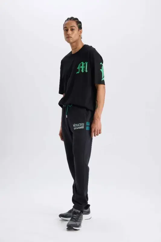 DeFactoFit NBA Milwaukee Bucks qalin jogger sport shimi Standart Kisim cho'ntakli belbog'li elastik etak - Qora - 4