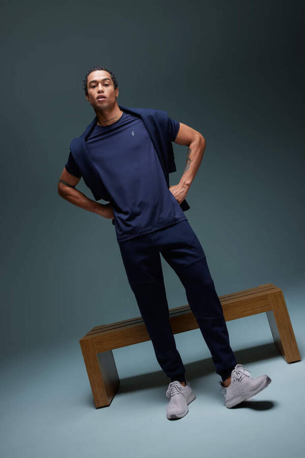 DeFactoFit Sporcu Jogger Eşofman Altı Slim Fit Dar Kesim Çift Cepli Beli Paçası Lastikli Skuba Dalgıç Kumaş Lacivert - 2