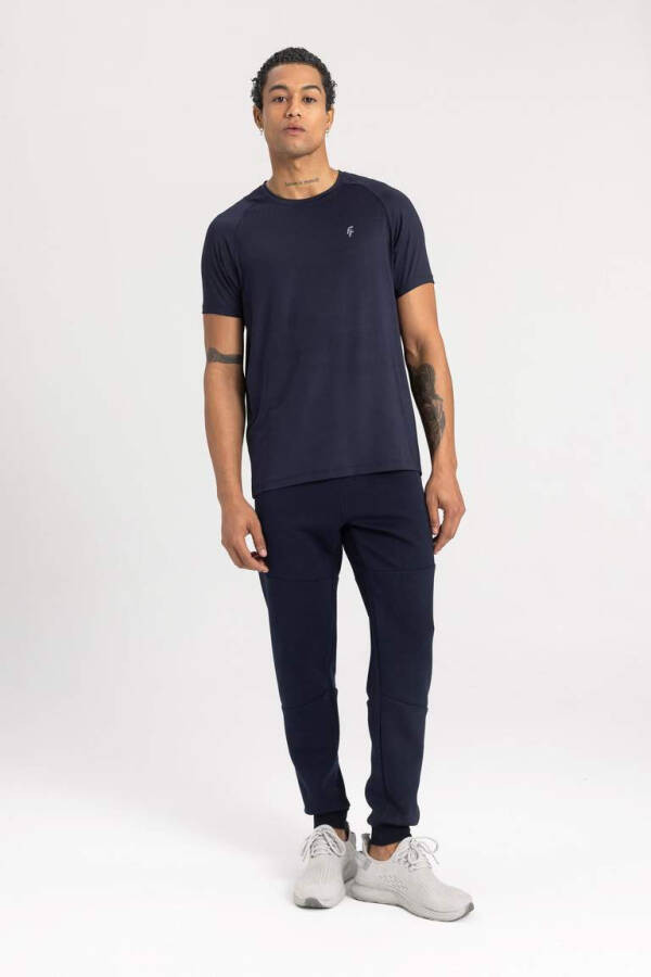 DeFactoFit Sporcu Jogger Eşofman Altı Slim Fit Dar Kesim Çift Cepli Beli Paçası Lastikli Skuba Dalgıç Kumaş Lacivert - 5