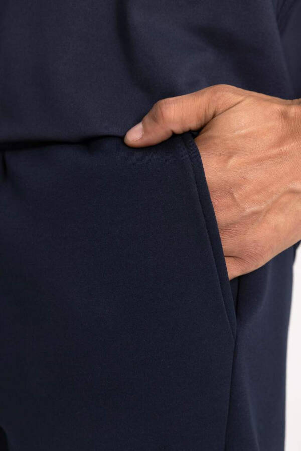 DeFactoFit Sporcu Jogger Eşofman Altı Slim Fit Dar Kesim Çift Cepli Beli Paçası Lastikli Skuba Dalgıç Kumaş Lacivert - 8