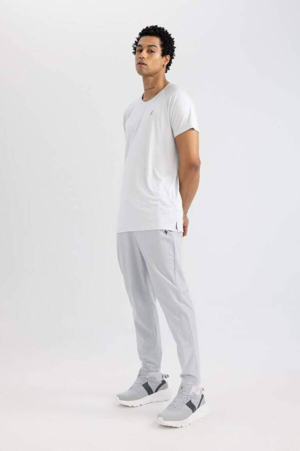 DeFactoFit Slim Fit Double Pocket Standard Leg Woven Jogger Sweatpants Light Grey - 2