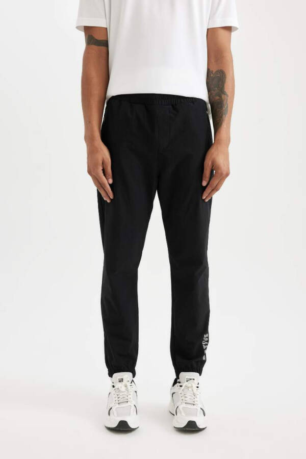 DeFactoFit Slim Fit Double Pocket Woven Sports Jogger Pants Black - 3