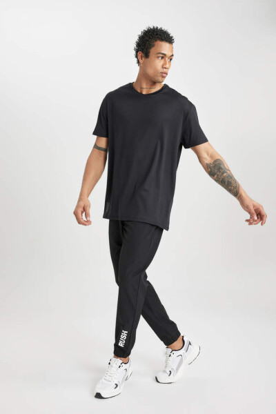 DeFactoFit Slim Fit Double Pocket Woven Sports Jogger Pants Black - 8